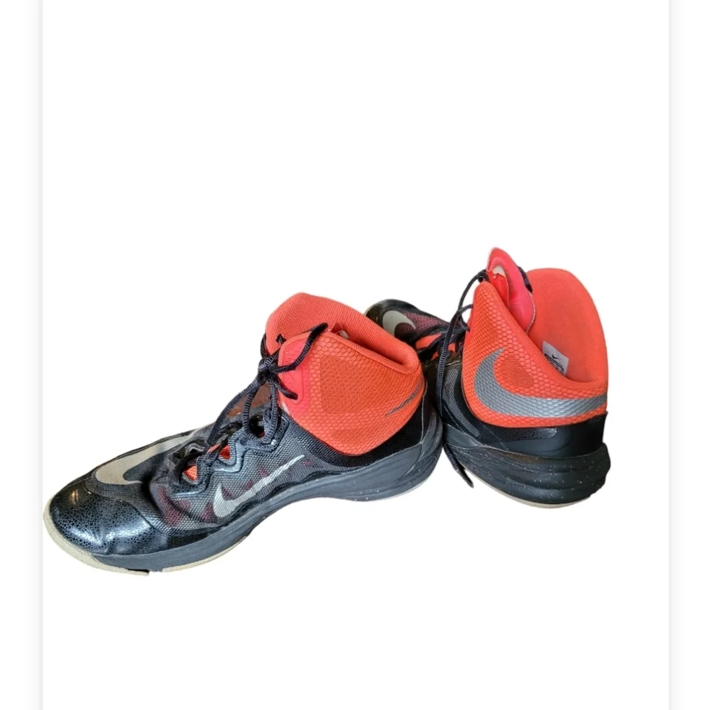 Nike black and orange men's size 9.5 tennis shoes